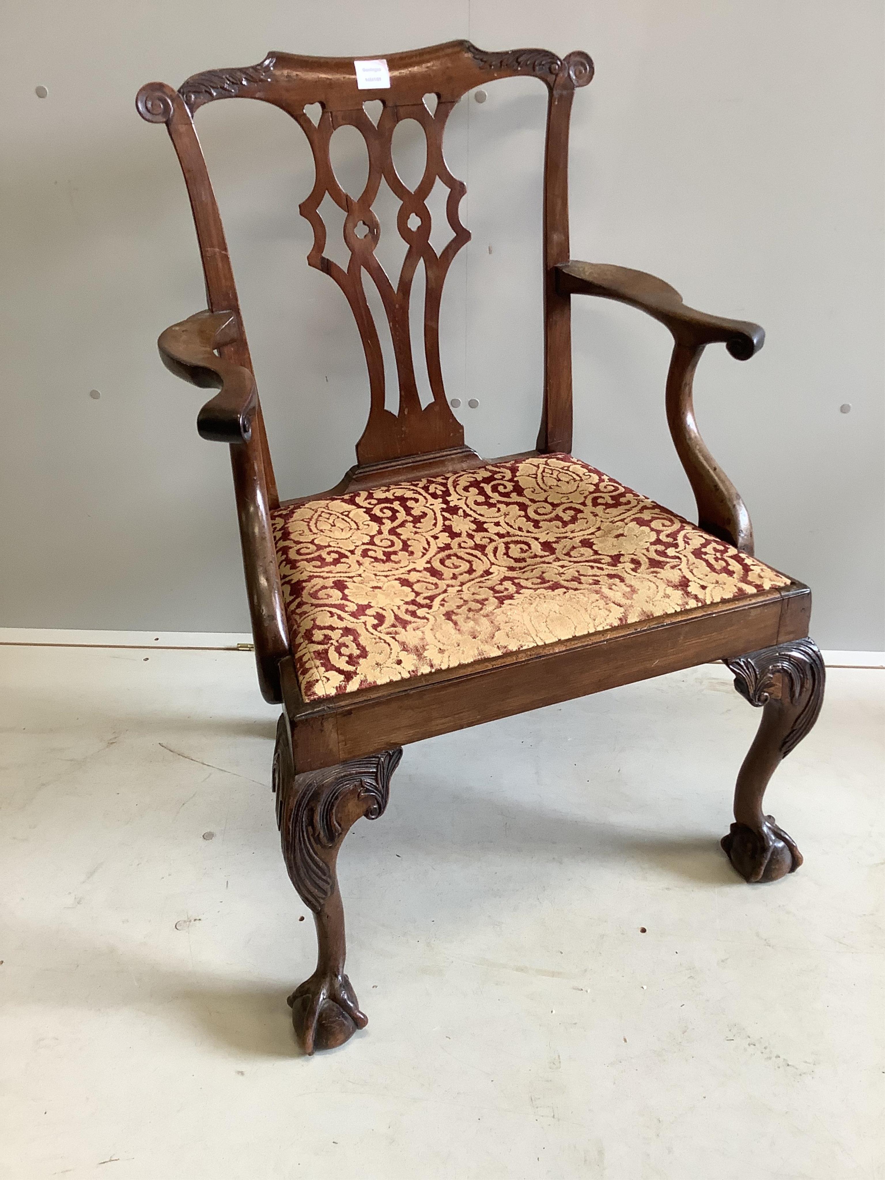 A George III Chippendale style mahogany elbow chair, width 66cm, depth 52cm, height 96cm. Condition - fair